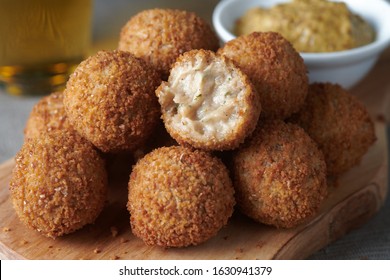 Bitterballen Are A Dutch Meat-based Snack, Made By Making A Very Thick Stew Thickened With Roux And Beef Stock And Generously Loaded With Meat.