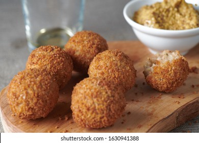 Bitterballen Are A Dutch Meat-based Snack, Made By Making A Very Thick Stew Thickened With Roux And Beef Stock And Generously Loaded With Meat.