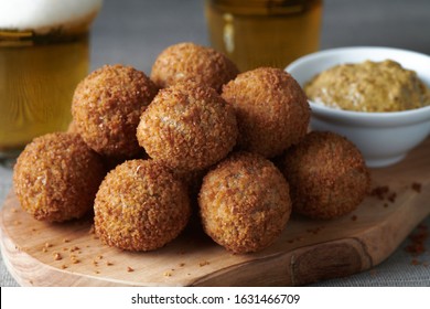 Bitterballen Are A Dutch Meat-based Snack, Made By Making A Very Thick Stew Thickened With Roux And Beef Stock And Generously Loaded With Meat.