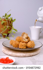 Bitterballen Are A Dutch Meat-based Snack, Made By Making A Very Thick Stew Thickened With Roux And Beef Served On Plate On The Table. 