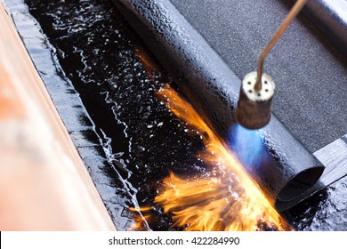 Bitumen roofing - Shutterstock ID 422284990
