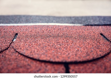 Bituminous Beaver Shingles On A Small Roof Of A Garden Shed