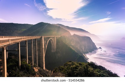 Bixby bridge,scenic ocean view point at Big Sur,highway 1 coastline scenic road,Carmel,California with horizon turquoise crazy wave of Pacific ocean with toned color and long exposure photographic