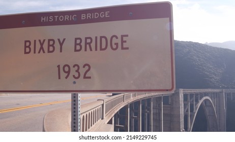 Bixby Creek Bridge Road Sign, Pacific Coast Highway 1 Landmark. Historic Scenic Cabrillo Road. Arch Architecture. Coastal Road Trip, Journey Or Travel By Ocean. Canyon In Foggy Weather. California USA