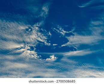 Bizarre cloud formations in the blue sky