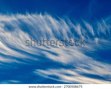Bizarre cloud formations in the blue sky