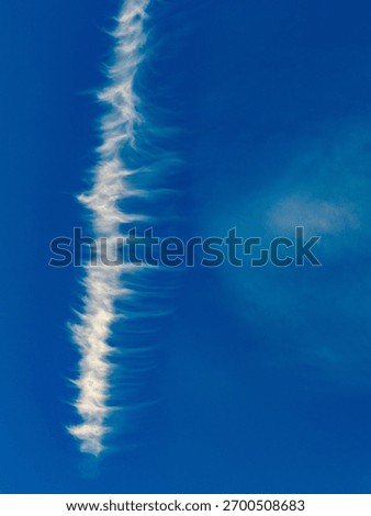 Bizarre cloud formations in the blue sky