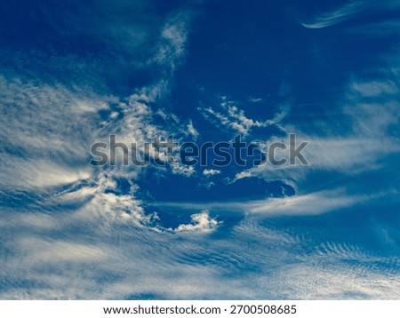 Bizarre cloud formations in the blue sky
