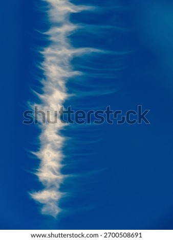 Bizarre cloud formations in the blue sky