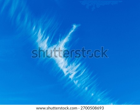 Bizarre cloud formations in the blue sky