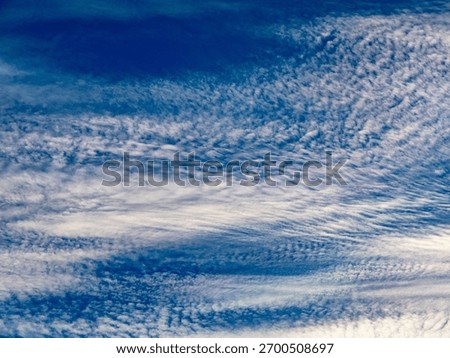 Bizarre cloud formations in the blue sky
