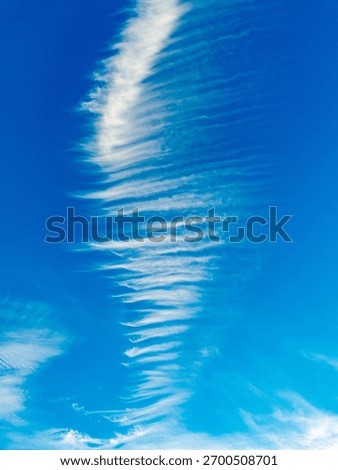Bizarre cloud formations in the blue sky