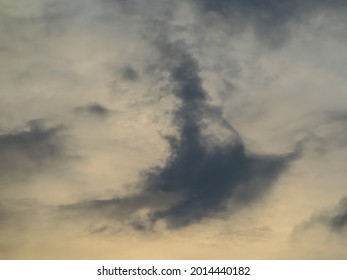 Bizarre dark cloud in the sky at sunset