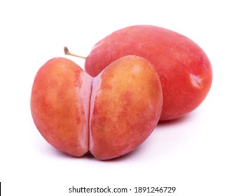 Bizarre Double Plum, Mutant Fruit In Heart-shape Isolated Over White Background