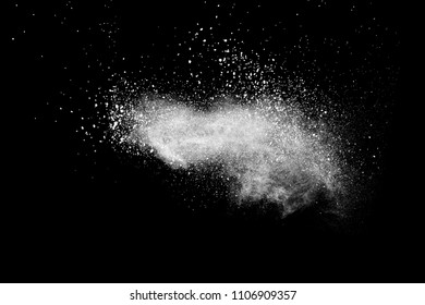 Bizarre forms of  white powder explosion cloud against dark background. Launched white particle splash on black background. - Powered by Shutterstock - Get 15% off with code: PIKWIZARD15