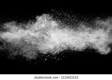 Bizarre forms of  white powder explosion against dark background. Launched white particle splashing.