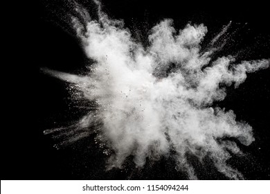 Bizarre forms of white powder explosion cloud against black background.
