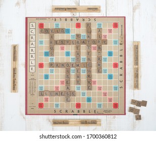 BKK - Apr 11, 2020 : A Scrabble Crossword Board Game With Genuine Wood Tiles And Racks In Coronavirus Vocabulary Related Words Concept. This Version Is Copyright By Selchow And Righter (1948).