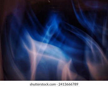black abstract background with gradations of smoke mixed red purple and blue and white .flatlay.design