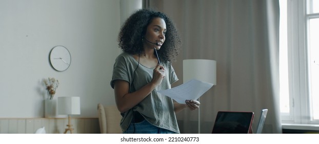 Black African American Female Working From Home, Having A Phone Call With Client Or Office. WFH, Stay Home