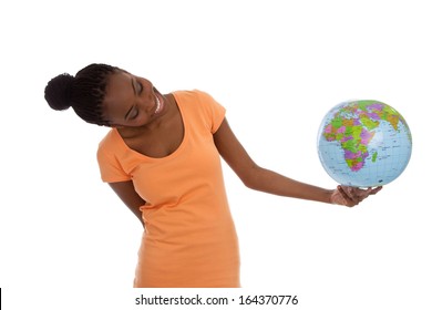 Black African American Woman Is Holding A Globe In Her Hands - Isolated On White.