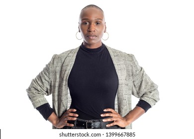 Black African American Woman Looking Confident While Wearing Modern Business Casual Outfit On A White Background.  The Businesswoman Is Depicting Bold Urban Fashion Style. 