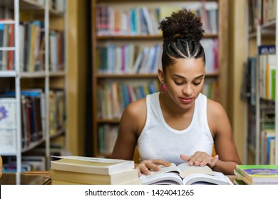 Black African American Young Girl Student Studying At The School University Library