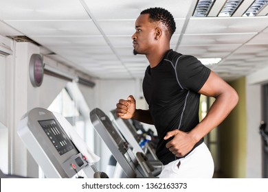 Black African American  Young Man Doing Cardio Workout At The Gym