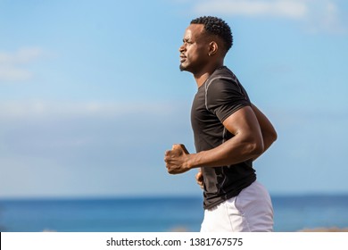Black african american young man running outdoor