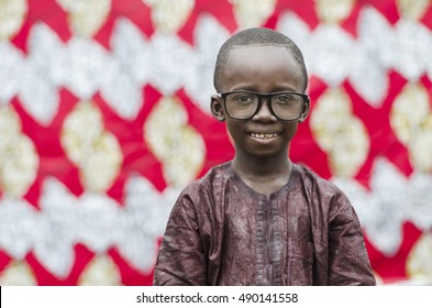 Black African Child Smiling With Nerdy Big Glasses On!