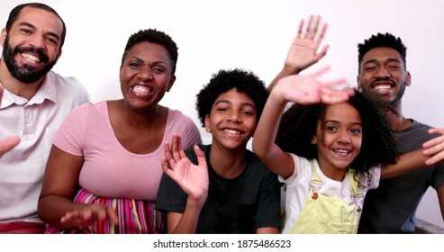 Black African Family Waving Hello To Camera, Parent And Kids Talking To Camera POV