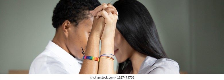 Black African LGBT Woman Hand In Hand With Asian LGBT Woman, Gay Pride Concept, Banner