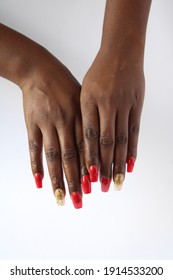 Black African Woman Hands With Manicure Nails And Nail Polish