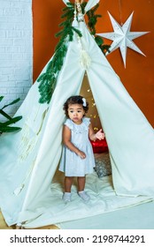 Black, African-american Girl Play In A Tent, Wigwam. Kid Is Sad And Scared. Baby Is Alone And Upset.