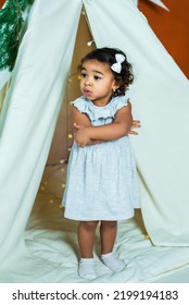 Black, African-american Girl Play In A Tent, Wigwam. Kid Is Sad And Scared. Baby Is Alone And Upset.