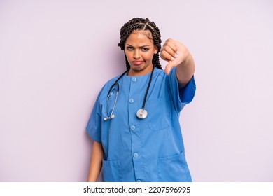 Black Afro Hairstyle Woman Feeling Cross,showing Thumbs Down. Nurse Concept