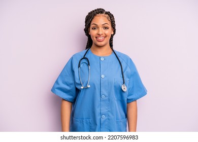 Black Afro Hairstyle Woman Looking Happy And Pleasantly Surprised. Nurse Concept