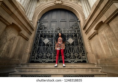 Black Afro Punk Girl Magic Fashion Shoot In A Huge Gateway. Powerful Ethnic Beauty And Style  