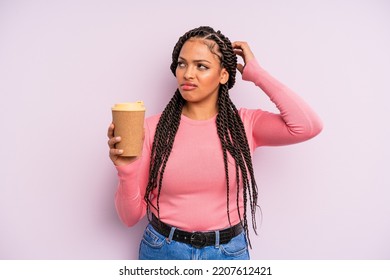 Black Afro Woman Feeling Puzzled And Confused, Scratching Head. Take Away Coffee