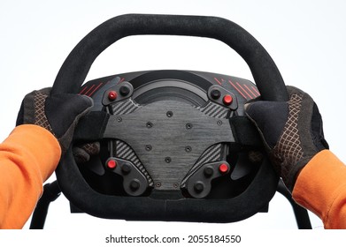 Black alcantara sport steering wheel in racer hands isolated