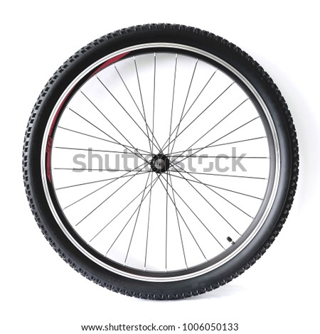 Black and alloy bicycle wheel isolated on white background