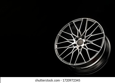 black alloy wheels, aluminum disc sport with a carbon fiber cover. Light weight and modern cool design. copy space maket - Shutterstock ID 1720972345