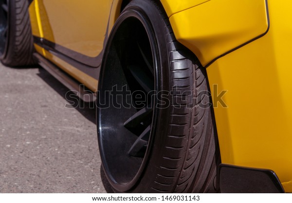 Black Alloy Wheels Racing Yellow Car Stock Photo Edit Now 1469031143