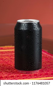 Black Aluminum Can, With Drops Of Water.