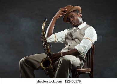 Black American Jazz Saxophone Player. Vintage. Studio Shot.