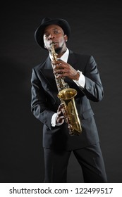 Black American Jazz Saxophone Player. Vintage. Studio Shot.