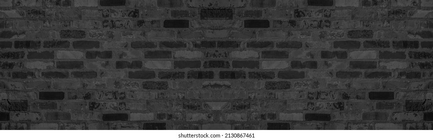 Black anthracite gray grey damaged rustic brick wall brickwork stonework masonry texture background banner panorama pattern template architecture.