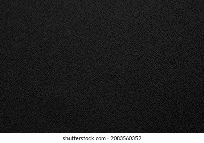 black artificial leather with waves and folds on PVC base - Shutterstock ID 2083560352