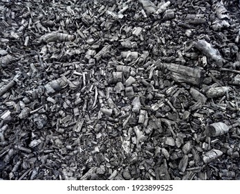 Black Ash Charcoal From Oven Background Texture, Gray Wood Ash Coal In Fireplace. Pile Of Ash Charcoal After Fire. Burned Out Wood Charcoal In Bbq Stove Grunge Light Black Natural Background Texture