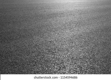 Black asphalt road surface texture